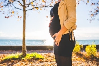 Unborn Child Cellphone Radiation - Pregnant Woman in Long Sleeve Top